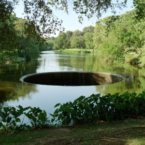 Image of man-made drain in a natural lake